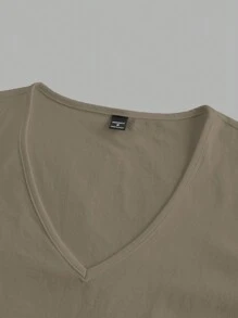 Manfinity Homme Camiseta casual de manga corta con cuello en V de color liso para hombre