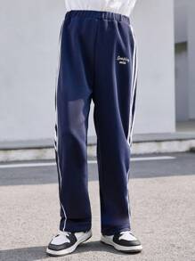 1 件 Tween Boy Genkimix 儿童条纹裤，休闲侧白条纹饰边增添活力气息，刺绣装饰彰显个性化，松紧腰带舒适贴合，宽松直筒设计让运动更自如，展现无忧无虑的街头风格 - 寶藍色 - 查看 1