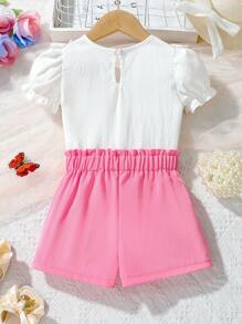 2 件套年轻女孩花卉印花圆领荷叶边下摆装饰短袖上衣和短裤套装，年轻女孩派对度假夏季服装