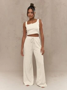 MISSGUIDED Conjunto de lujo de dos piezas de punto acanalado para estar en casa - conjunto de ropa de estar compuesto por top corto y pantalón de pierna ancha, ideal para yoga, viajes y ocio