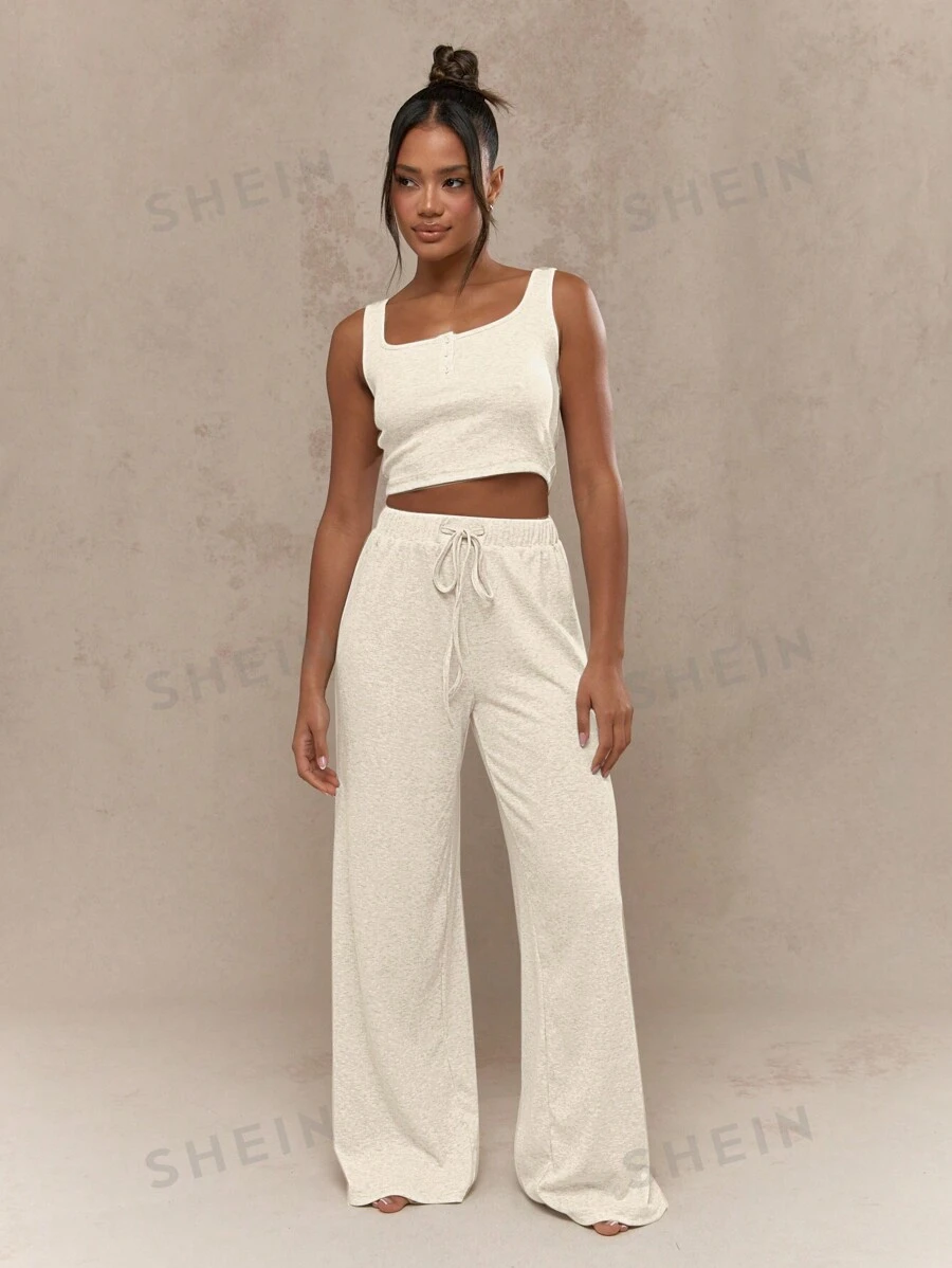 MISSGUIDED Conjunto de lujo de dos piezas de punto acanalado para estar en casa - conjunto de ropa de estar compuesto por top corto y pantalón de pierna ancha, ideal para yoga, viajes y ocio