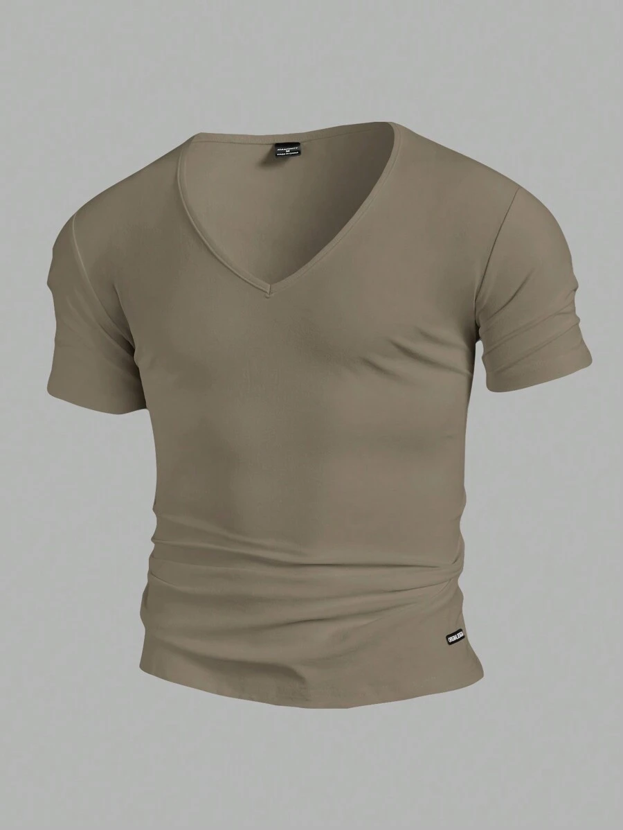Manfinity Homme Camiseta casual de manga corta con cuello en V de color liso para hombre