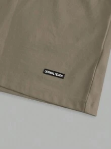 Manfinity Homme Camiseta casual de manga corta con cuello en V de color liso para hombre