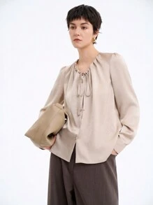 Aalyst Chemise à manches longues pour femmes avec col rond élégant, cordon coulissant, nœud papillon et boutons devant. Convient pour le printemps, l'automne et l'hiver