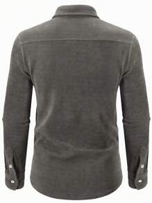 Manfinity Homme Camisa casual de manga larga con bolsillo y botones de unicolor para hombres de talla grande