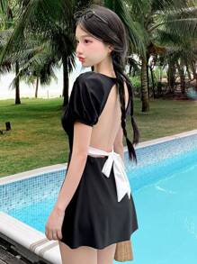 DAZY Costume da bagno monopezzocon maniche a palloncino, schiena aperta e laccetti, bicolore, casual, adatto per l'estate e le vacanze al mare - Bianco e nero - Visualizzare 1