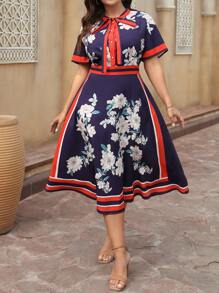 SHEIN Clasi Robe d'été casual pour femmes grandes tailles, à manches courtes, avec nœud papillon, imprimé floral multicolore. Élégante et rafraîchissante, vêtement décontracté. Robe longue de soirée élégante. Style de robe de ville pour femmes. Tenues d'été pour femmes. Saint-Patrick, tenues de rave, tenues de festival de printemps, style bohème de la Saint-Patrick - Multicolore - Voir 1