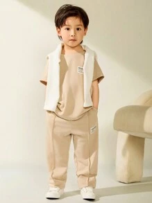 2 件套休闲百搭短袖 T 恤和长裤套装，适合年轻男孩，适合外出、上学、日常聚会、春夏季 - 杏色 - 查看 1