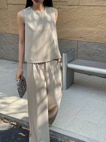 DAZY Women's 2 Pieces Set: Solid Color Loose Tied Camisole And Wide Leg Pants - Apricot - View 7