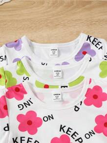 SHEIN Ensemble assorti de jeune fille comprenant un short à imprimé floral d'été, un t-shirt top casual à manches courtes et col rond, ainsi qu'un legging de couleur unie - Multicolore - Voir 3