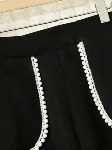 Lacomfia بناطيل نسائية بقصة واسعة ذات خصر مرن وتريمات زهور للمقاسات الكبيرة - الأسود - مشاهدة 6