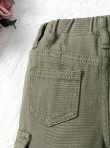 Różowe, proste, jeansowe spodnie typu utility dla dziewczynek