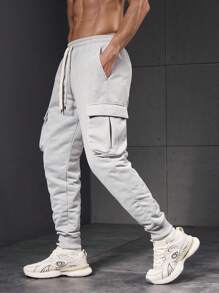 Manfinity Sport PWRUP Pantalon de sport pour hommes à taille élastique et liens aux chevilles, minimaliste et décontracté