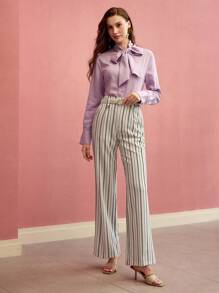 MOTF PREMIUM Pantalones acampanados con bolsillo sesgado a rayas
