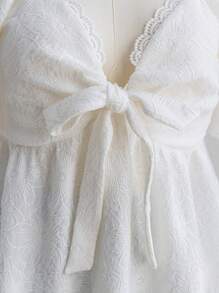 Dreamara Áo kiểu nữ cỡ lớn, chất liệu vải hoa văn, cổ tim, nơ, bèo nhún, tay ngắn, dáng chữ A, thích hợp cho mùa xuân. - trắng - Xem 6