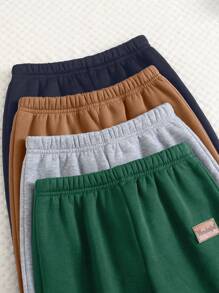 SHEIN Leap Crew 4 piezas Pantalones cómodos de estilo universitario para niños pequeños, con decoración práctica y sencilla, suaves, gruesos y abrigados, económicos, adecuados para conjuntos de ropa de niños, ropa familiar a juego, fiesta de cumpleaños, vida diaria, escuela, viajes y deportes, apropiados para otoño e invierno