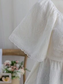 Dreamara Áo kiểu nữ cỡ lớn, chất liệu vải hoa văn, cổ tim, nơ, bèo nhún, tay ngắn, dáng chữ A, thích hợp cho mùa xuân. - trắng - Xem 7