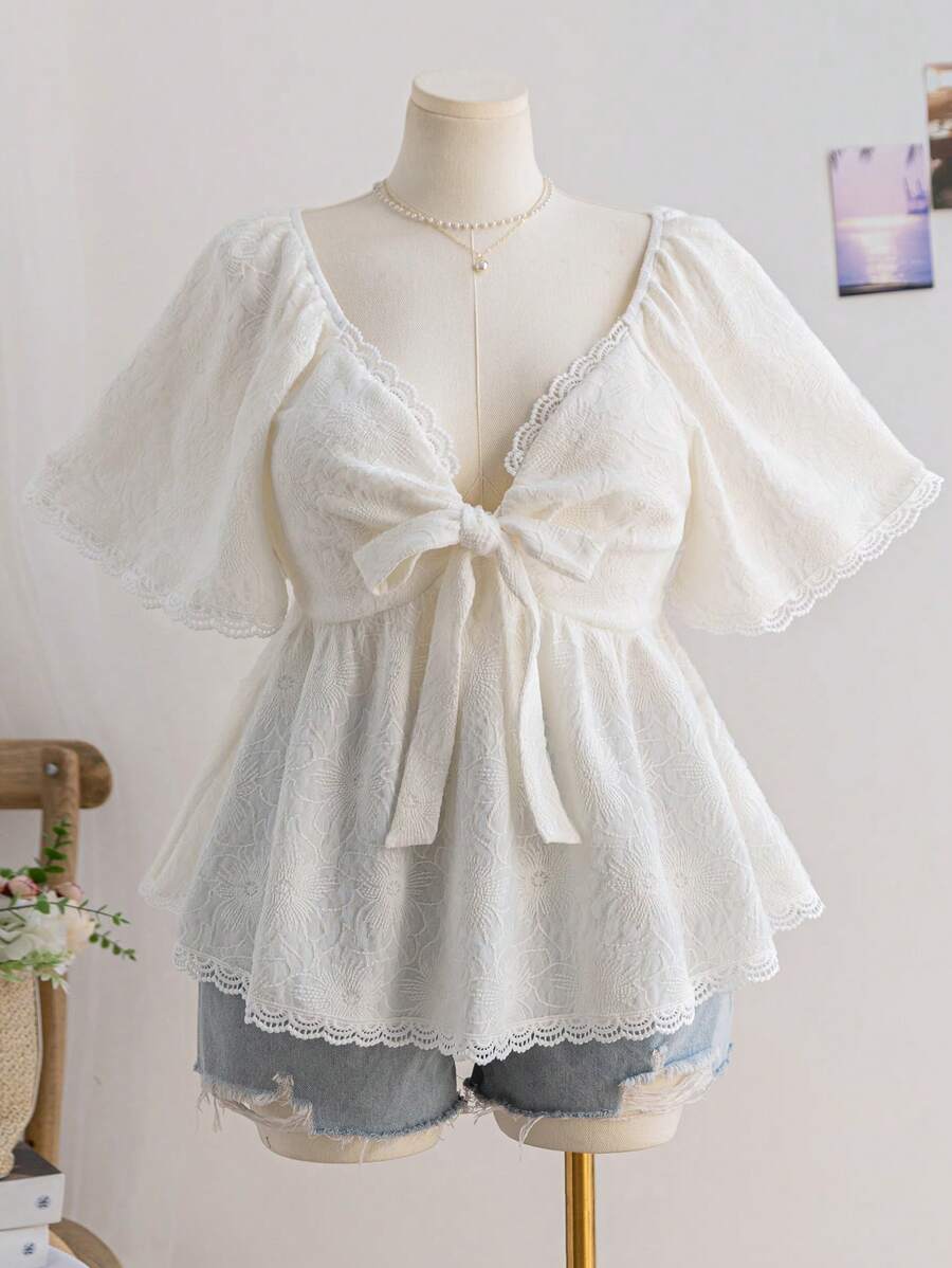 Dreamara Áo kiểu nữ cỡ lớn, chất liệu vải hoa văn, cổ tim, nơ, bèo nhún, tay ngắn, dáng chữ A, thích hợp cho mùa xuân. - trắng - Xem 1