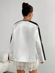 StreetHx T-shirt manches longues, matériau de sport décontracté, col côtelé en blocs de couleurs, imprimé sur les manches et l'avant