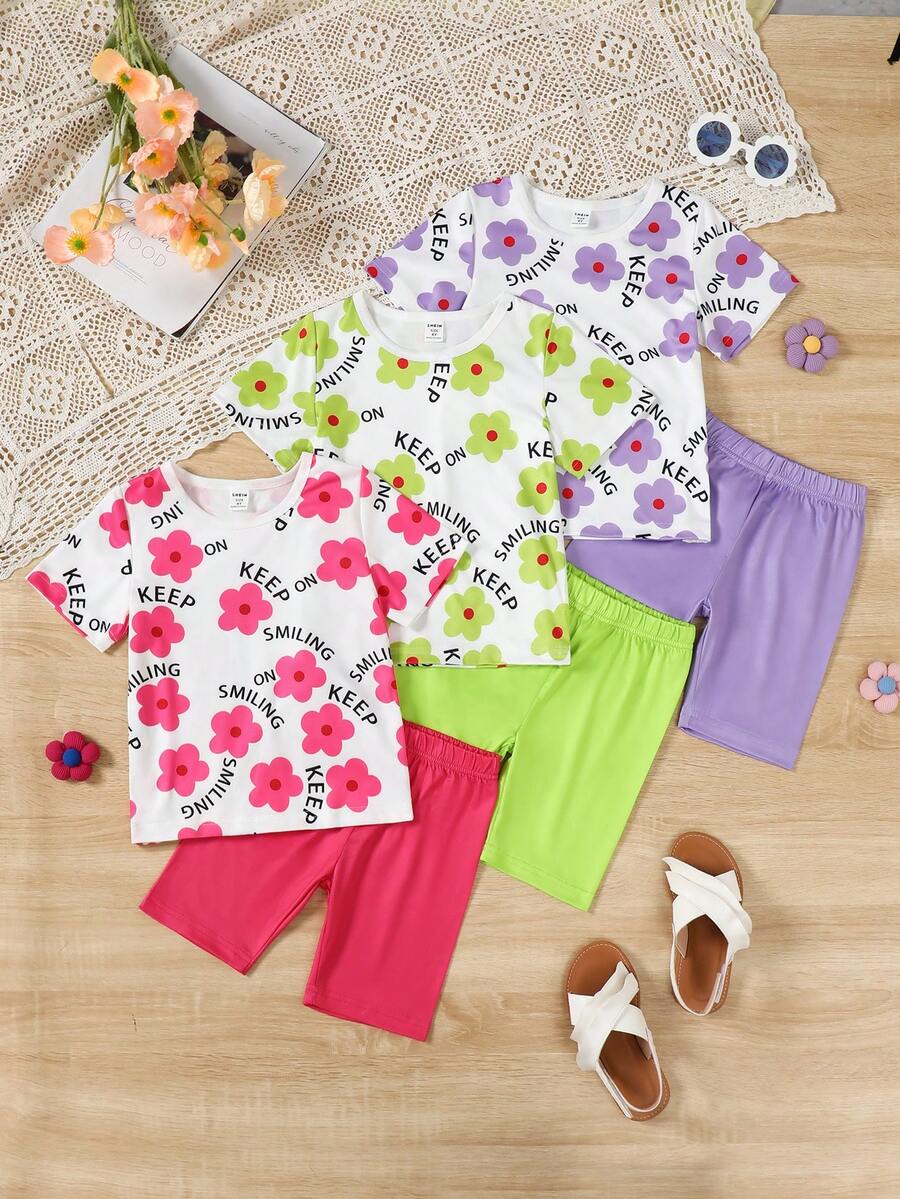 SHEIN Ensemble assorti de jeune fille comprenant un short à imprimé floral d'été, un t-shirt top casual à manches courtes et col rond, ainsi qu'un legging de couleur unie - Multicolore - Voir 1