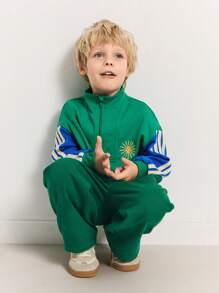 THE HAPPY LOOK Sweat-shirt à demi-zip, épaules tombantes et manches longues avec bloc de couleurs pour jeunes garçons, style sportif décontracté