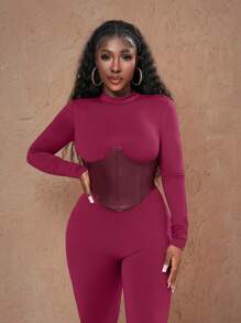 Slaydiva Neue Lässig Street Jumpsuit für Herbst und Winter mit Stehkragen, Langarm, PU Fake Gürteldesign, braun melierter Strickstoff mit PU Hose, enge Passform für Damen