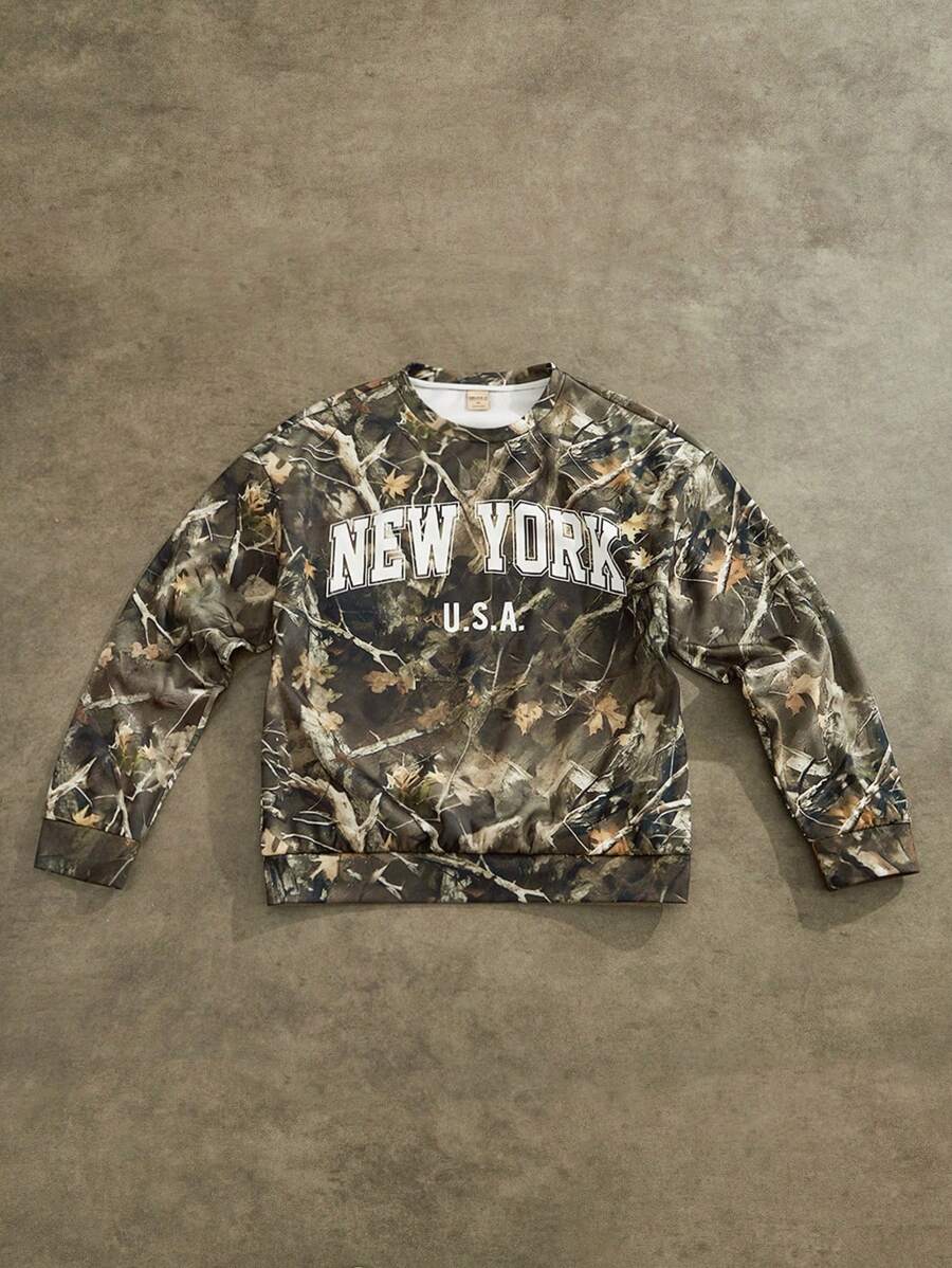 Forever 21 Herren lässiger minimalistischer Sweatshirt mit New York Buchstaben- und Baumzweig Tarnmuster, weiter Ausschnitt - Verschiedenfarbig - Übersicht 1