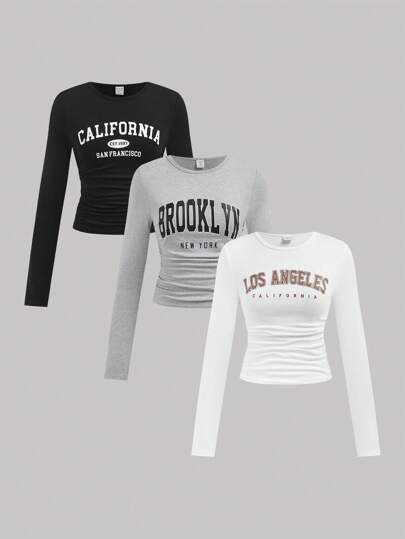 SHEIN Girlism Ragazza adolescente 1 Ottieni 2 Gratis, set da 3 pezzi di Maglia a tinta unita con collo tondo e arricciature, top corto casual minimalista vintage con grafica americana inglese, maglietta a maniche lunghe a collo tondo aderente