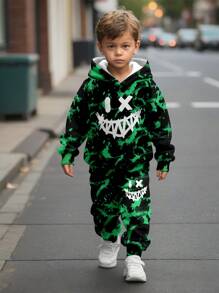 SHEIN Set de 2 piezas para niños pequeños: sudadera con capucha holgada con estampado gráfico y pantalones, estilo deportivo de ocio con estampado de sonrisa malvada