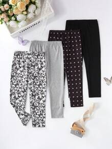 Set de 4 leggings largos con estampado de mariposas y flores todo sobre negro y gris para niña joven