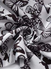 Set de 4 leggings largos con estampado de mariposas y flores todo sobre negro y gris para niña joven