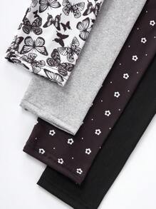 Set de 4 leggings largos con estampado de mariposas y flores todo sobre negro y gris para niña joven