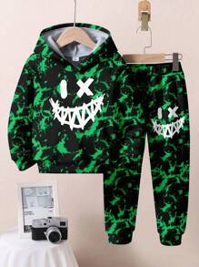 SHEIN Set de 2 piezas para niños pequeños: sudadera con capucha holgada con estampado gráfico y pantalones, estilo deportivo de ocio con estampado de sonrisa malvada