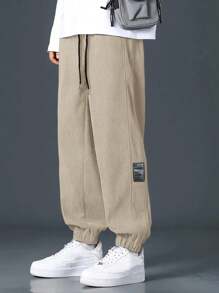 Manfinity Hypemode Men Loose Letter Print Drawstring Waist Ankle Tied Pants
