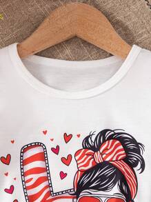 SHEIN 2 piezas Conjunto de verano para niña con diseño gráfico del Día de los Enamorados, camiseta de manga corta de cuello redondo y pantalones cortos rectos con cordón en la cintura, conjunto casual sencillo para uso diario