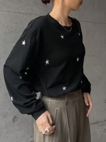 FRIFUL Camiseta de manga larga con cuello redondo y hombros caídos con estampado de estrella para mujer, otoño