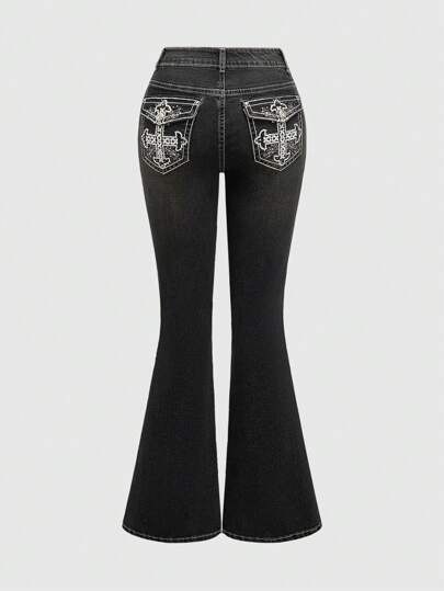 Jean skinny noir avec poche brodée, croix strass et style Y2K