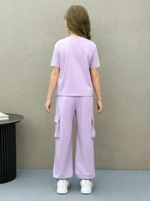 SHEIN Conjunto de top de manga corta de cuello redondo y pantalones de chándal informales para niñas preadolescentes