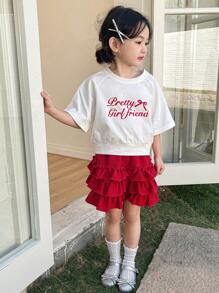DAZY Set de 2 piezas con blusa de cuello redondo y manga corta con estampado de letras y shorts casual para niñas, conjunto de ropa de verano para niñas