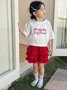DAZY Set de 2 piezas con blusa de cuello redondo y manga corta con estampado de letras y shorts casual para niñas, conjunto de ropa de verano para niñas