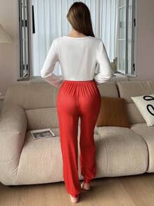 بيجامة كاجوال مكونة من ملابس علوية طويل الأكمام برقبة دائرية وبنطلون مطبوع للنساء