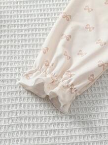 SHEIN Set de 2 piezas de pijama informal para niñas bebé con top de manga corta con botones y estampado de mariposa en color albaricoque, y pantalones - Albaricoque - Ver 6