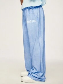 SHEIN 1pc Tween Boy Loose Straight Leg Pants, Boys Solid Color Casual Comfortable Wide Leg Pants, Elastic Waist For Easy Wear, Letter Print Detail, Minimalist Design And Fresh Colors To Lead The Fashion - Blue - View 5