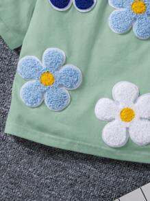 SHEIN LMoss Kids Young Girl Loose Fit Cute Floral Print Short Sleeve T-Shirt With Round Neckline And Drop Shoulders