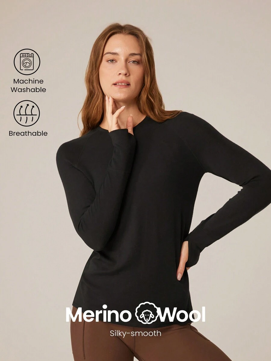 GLOWMODE Áo thun cơ bản dài tay Wram Elevate Slim Fit dáng ôm vừa vặn với hông có lỗ xỏ ngón tay cái tập luyện Yoga hàng ngày - màu đen - Xem 1