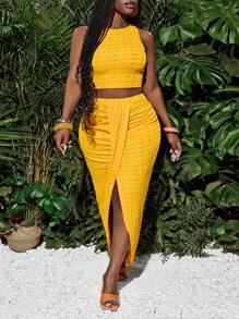 Slaydiva Nieuwe lente en zomer casual vakantie ronde hals mouwloos cropped vest + midden voorkant overlappende geplooide hoge split tot dij boog zoom asymmetrische zoom rok gele textuur stof dames tweedelige set