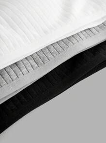Conjunto de 3 piezas de blusas de tubo sencillas en negro, blanco y gris con almohadillas para el pecho y diseño antideslizante para niñas preadolescentes
