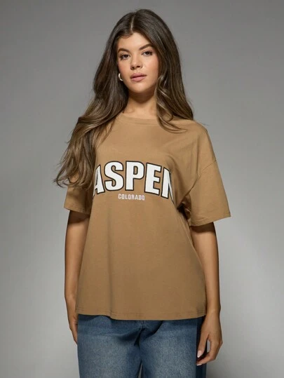 MISSGUIDED Aspen Colorado Oversized Graphic T-Shirt Casual Travel Destination Statement Tee Mountain Resort Vacation Wear College Style Winter Fashion