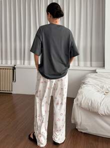 DAZY Set de 2 piezas de pijama de mujer con estampado de dibujos animados de manga corta y holgado, ropa de vuelta al colegio