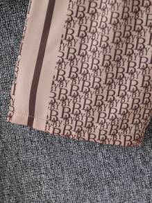 Souflis Souflis 2 件套年轻男孩休闲学院风字母和数码印花 Polo 衫和全印花短裤，适合 4-7 岁男孩春夏季穿着。此套装适合户外和室内穿着。 - 白色 - 查看 7